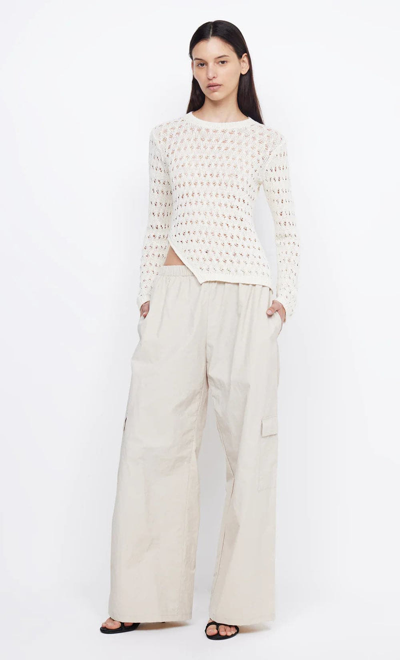 Brooke Long Sleeve Asymmetrical Knit Top in Ivory - Ché by Chelsey